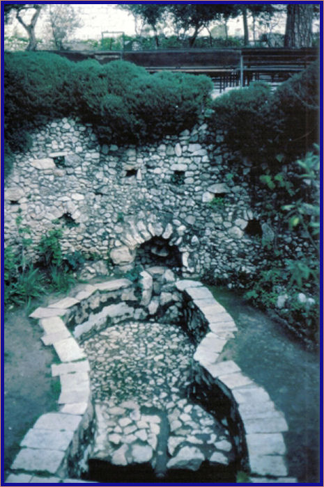 There is an ancient olive press located near the tomb